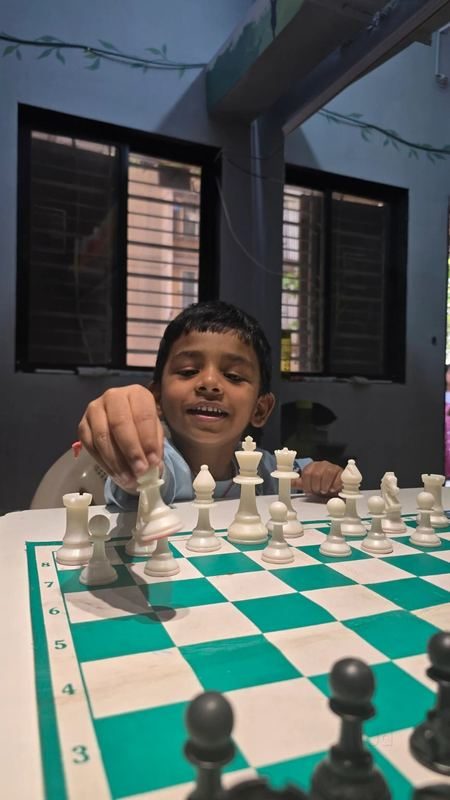 Boy playing chess at Fitbeat Studio Nahur East