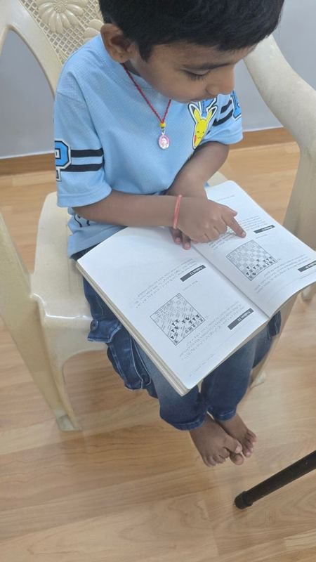 Child studying chess at Fitbeat Studio Bhandup