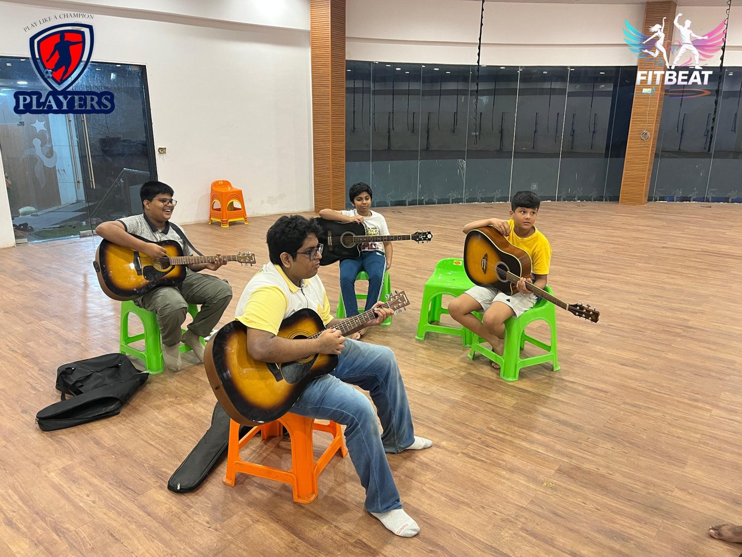 Guitar class group session at Fitbeat Nirmal Lifestyle Mulund West